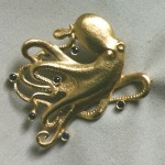 Spilla in oro giallo e zaffiri