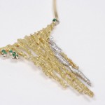 Pendente in oro diamanti e smeraldi